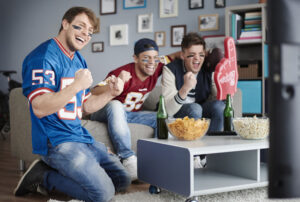 group of people watching a football game